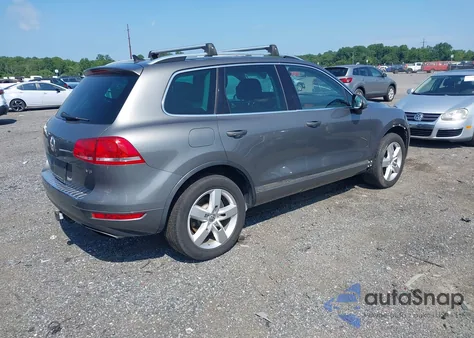 2014 Volkswagen Touareg 3.6L Lux z USA, uszkodzony, nr VIN WVGEF9BP1ED009269